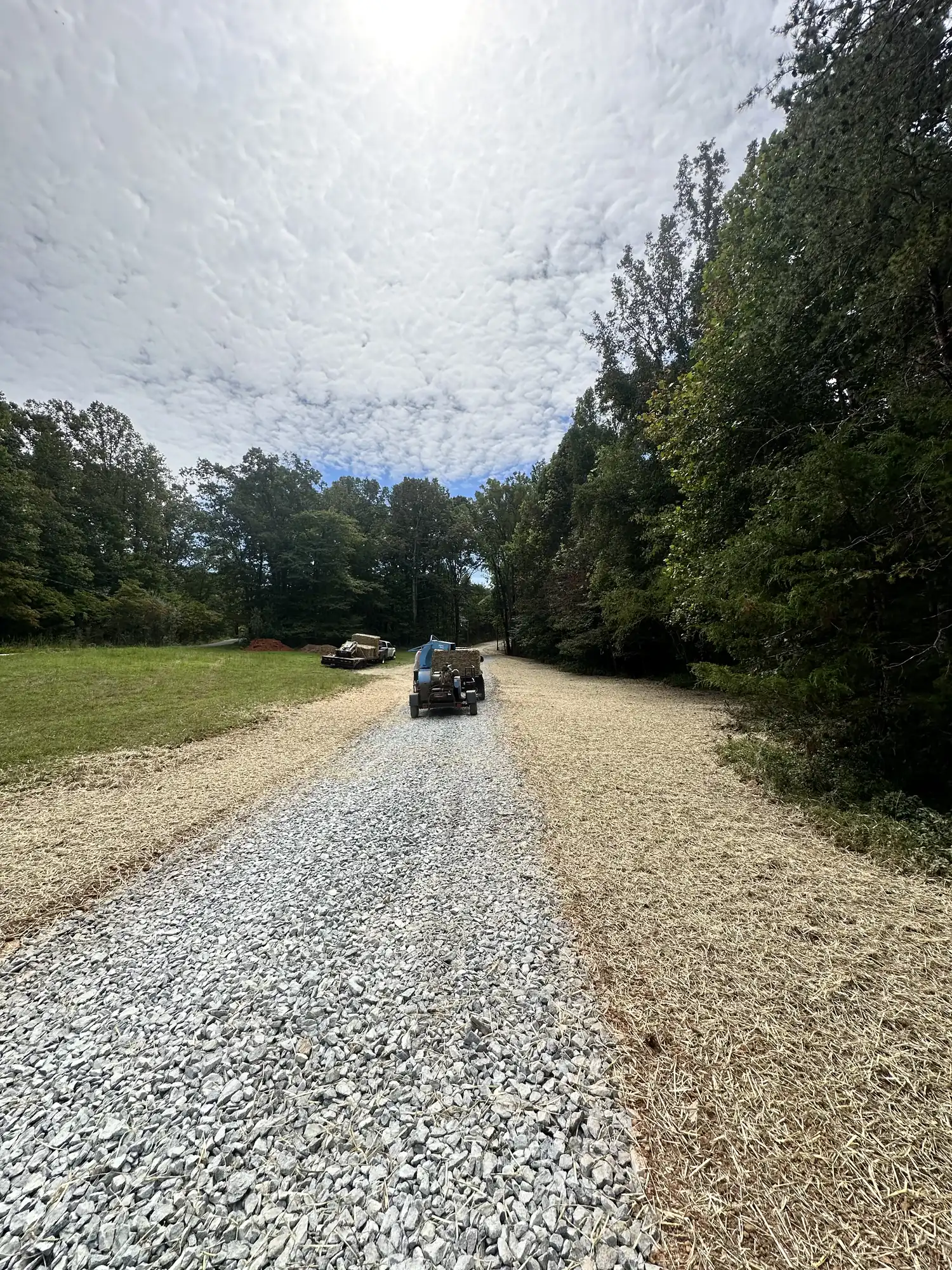 Long gravel driveway project with vanishing-point perspective near Roanoke