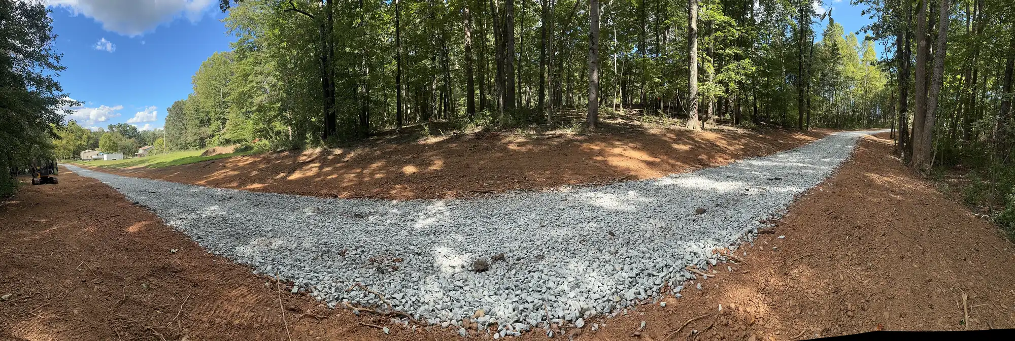 Tunstall's equipment and completed driveway project near Roanoke